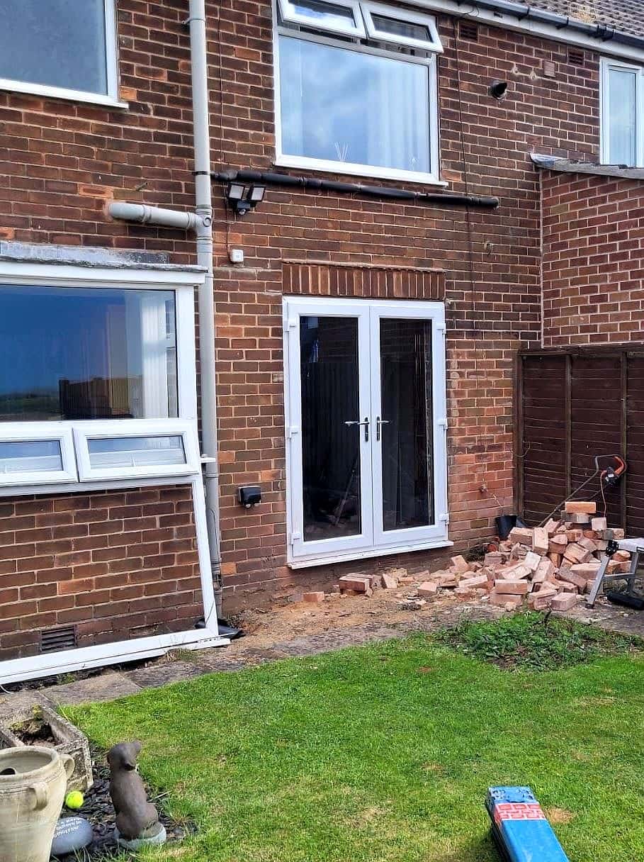 The same rear wall with new French doors fitted